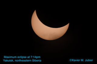 Astrophotographer Xavier Jubier took this photo of the partial solar eclipse of Aug. 11, 2018 over Yakutsk, Russia. There, the moon covered 57 percent of the sun's disk when the ecipse reached its maximum at 7:14 p.m. local time (1014 GMT).