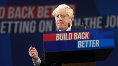 Boris Johnson during his party conference speech in Manchester
