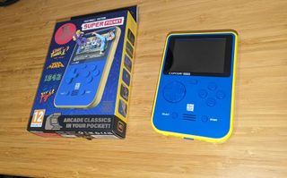Super Pocket review; a boxed handheld console and unboxed console