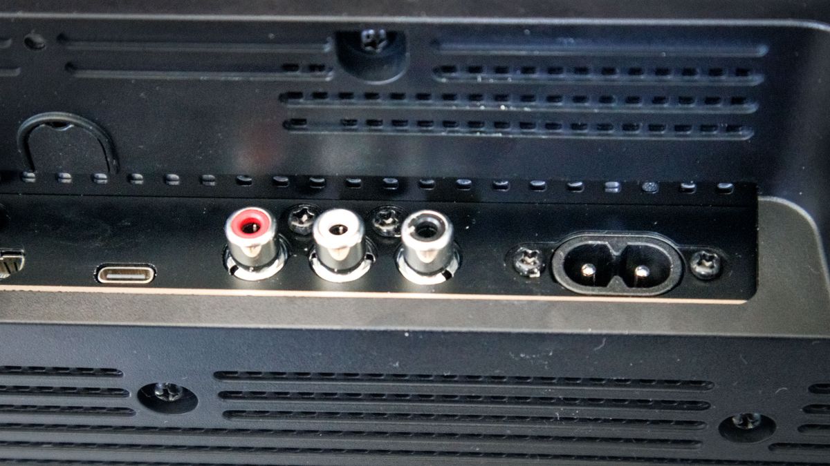 The ports on a Marshall Heston 120 soundbar on a TV stand.