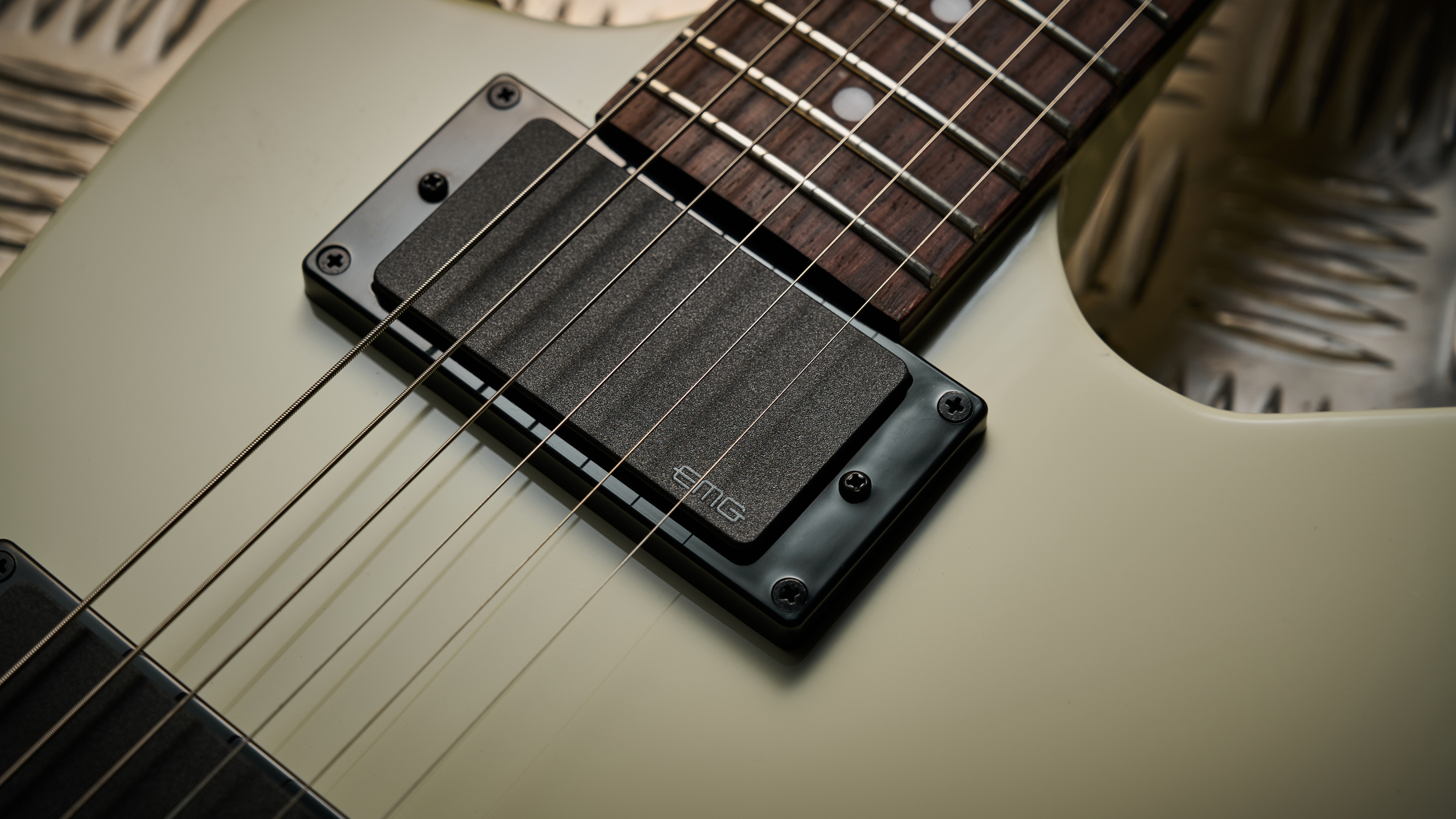 The neck EMG humbucker on the Epiphone Explorer 80s EMG