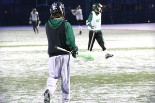 Lacrosse players on the field, injuries