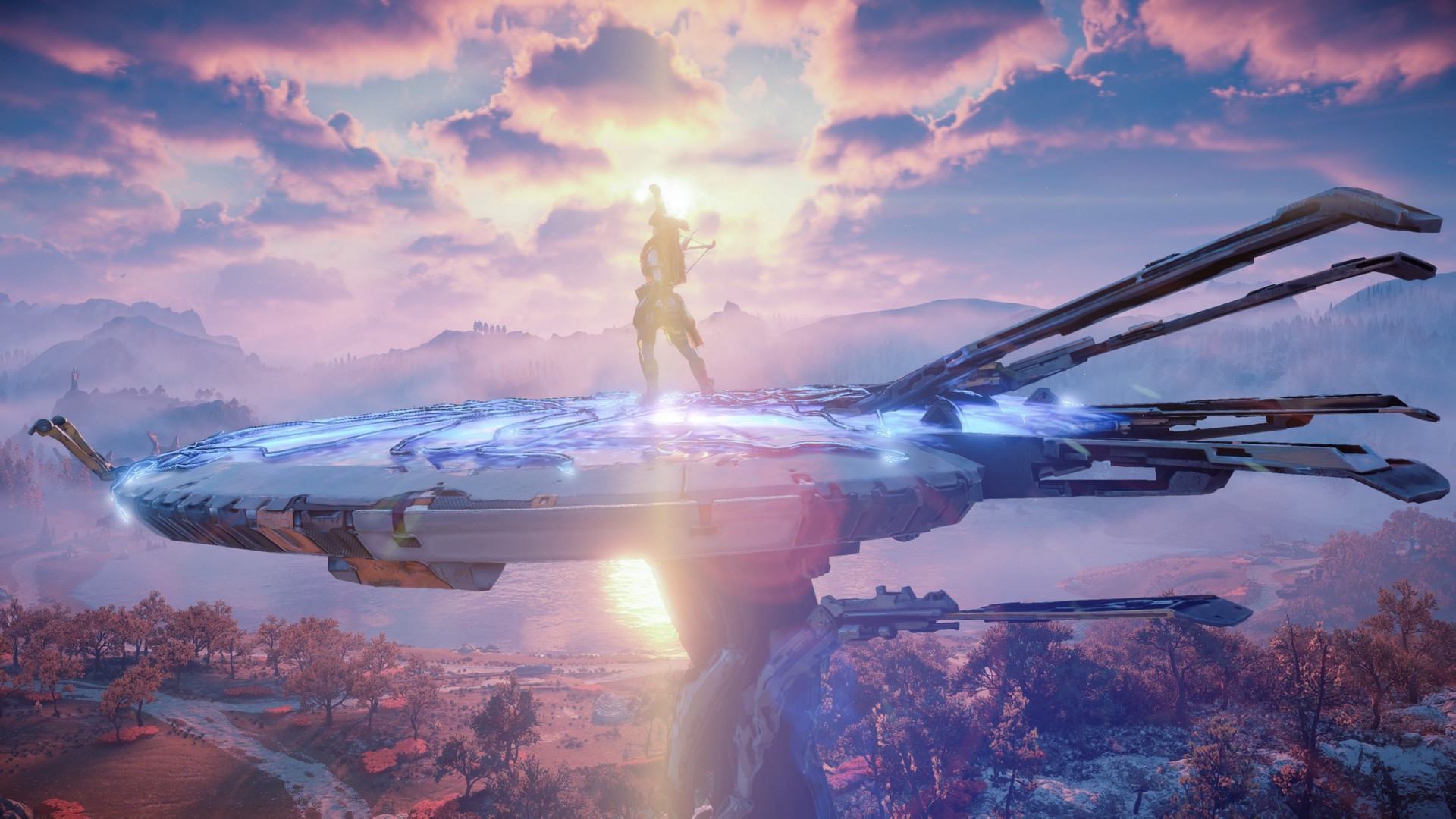 Aloy stands atop a Tallneck in Horizon Forbidden West with the sun behind her