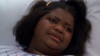 Octavia Spencer lying in a bed, looking upset in ER.