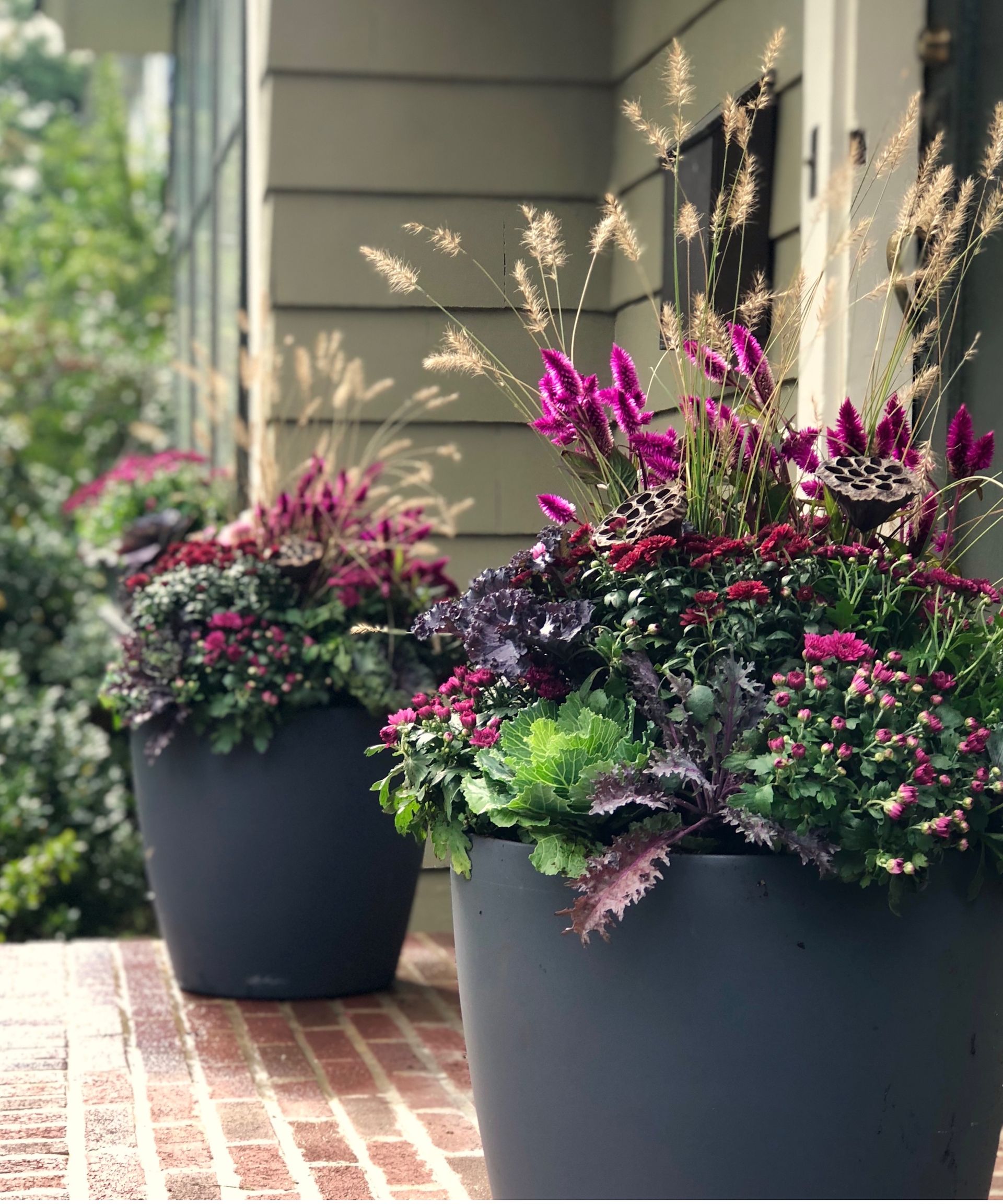 The Inspired Garden fall porch planters with layered planting