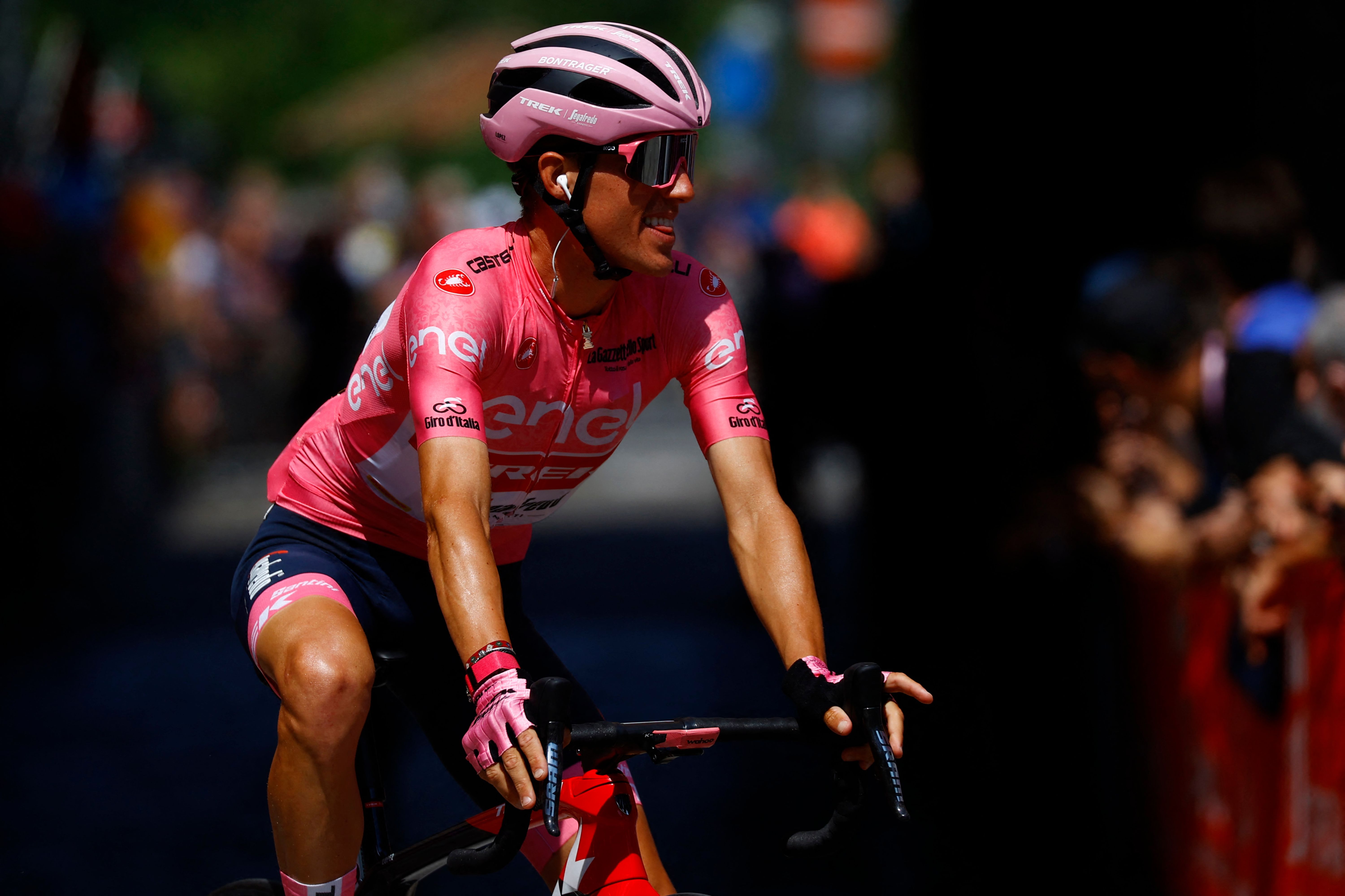 Overall leader Team Treks Spanish rider Juan Pedro Lopez rides to the teams presentation prior to the start of the 12th stage of the Giro dItalia 2022 cycling race 204 kilometers from Parma to Genova on May 19 2022 Photo by Luca Bettini AFP Photo by LUCA BETTINIAFP via Getty Images