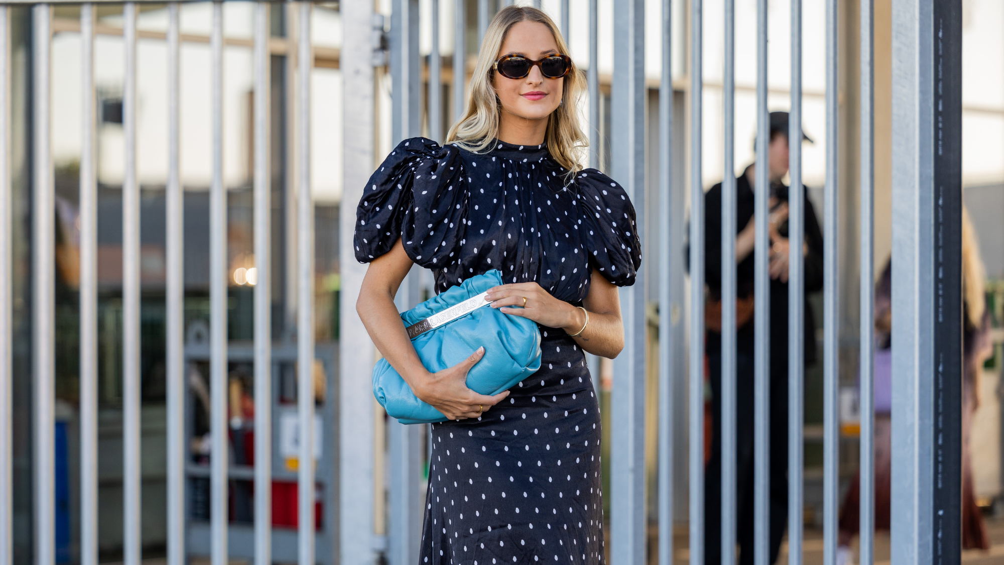 best dress rental - street style shot of a woman wearing a dress