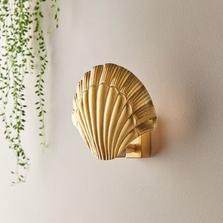 Smaller Calico Wall Light in Antique Brass