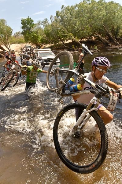 Jeroen Boelen (Milka-Trek) leads a river crossing