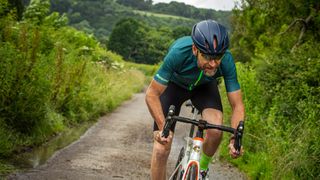 Cyclist wearing an aero helmet