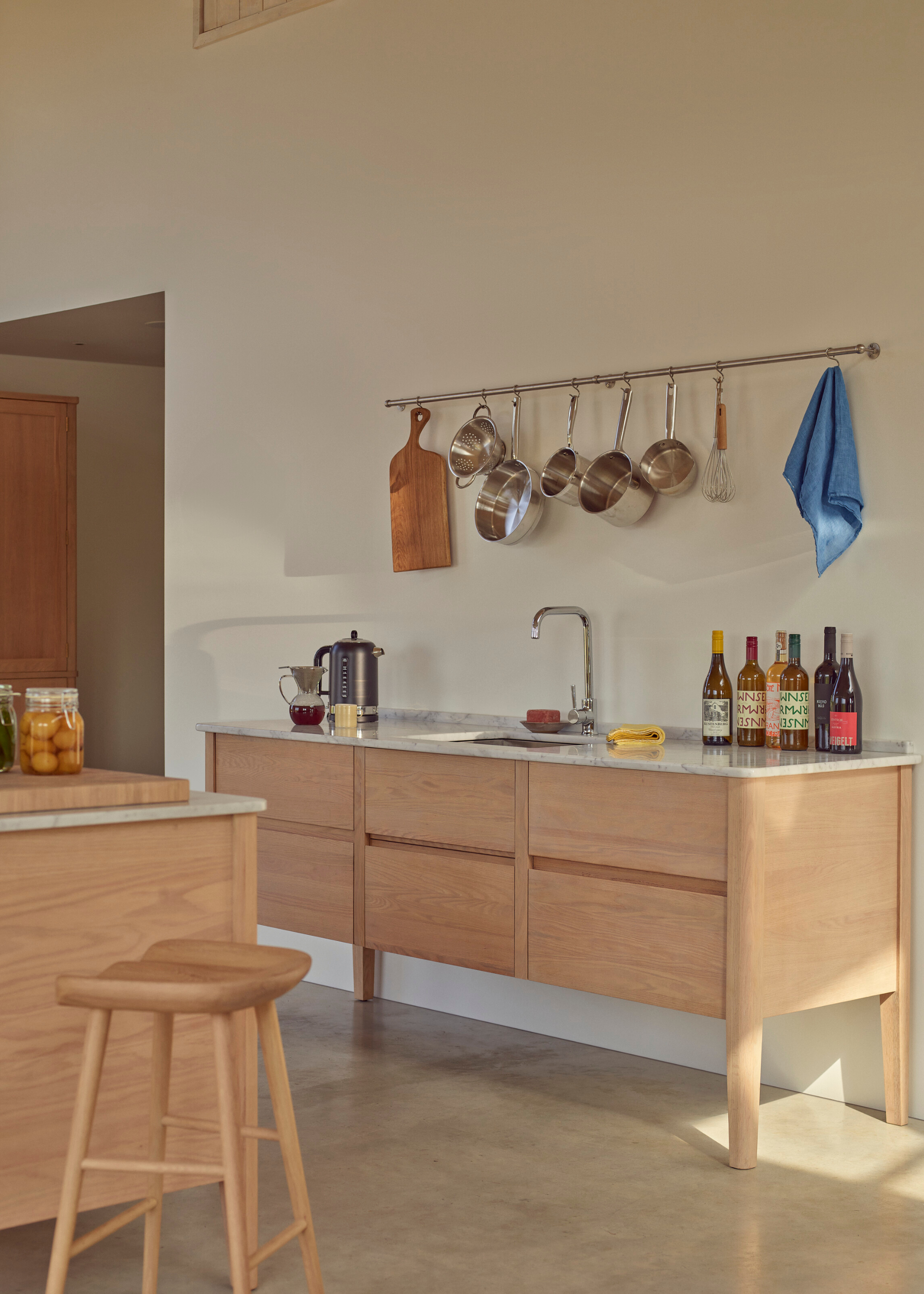 freestanding wooden sink section with lots of storage beneath the sink