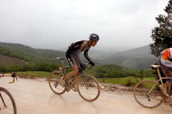 Michael Barry, Team Sky's riders names are emblazoned on their sides, so they were easier to pick out with mud-caked race numbers not much use.