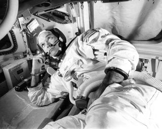 Michael Collins training in the Apollo command module simulator in preparation for the Apollo 11 mission in June 1969.