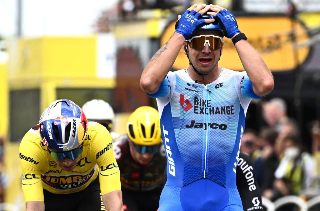TOPSHOT Team BikeexchangeJayco teams Dutch rider Dylan Groenewegen celebrates as he crosses the finish line to win the 3rd stage of the 109th edition of the Tour de France cycling race 182 km between Vejle and Sonderborg in Denmark on July 3 2022 Photo by Marco BERTORELLO AFP Photo by MARCO BERTORELLOAFP via Getty Images