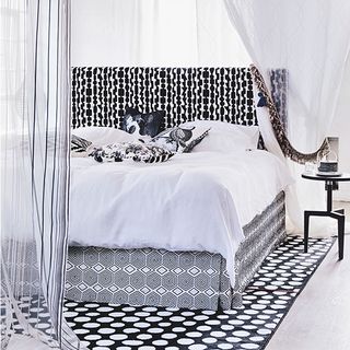 bedroom with black and white carpet