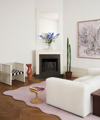 Cream living room with dark wood flooring