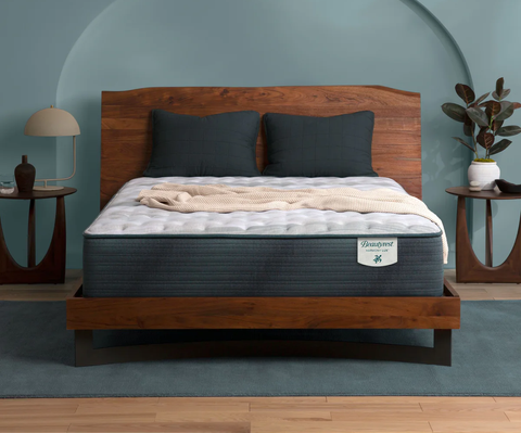 A Beautylux Harmony Lux mattress on a wooden bedframe