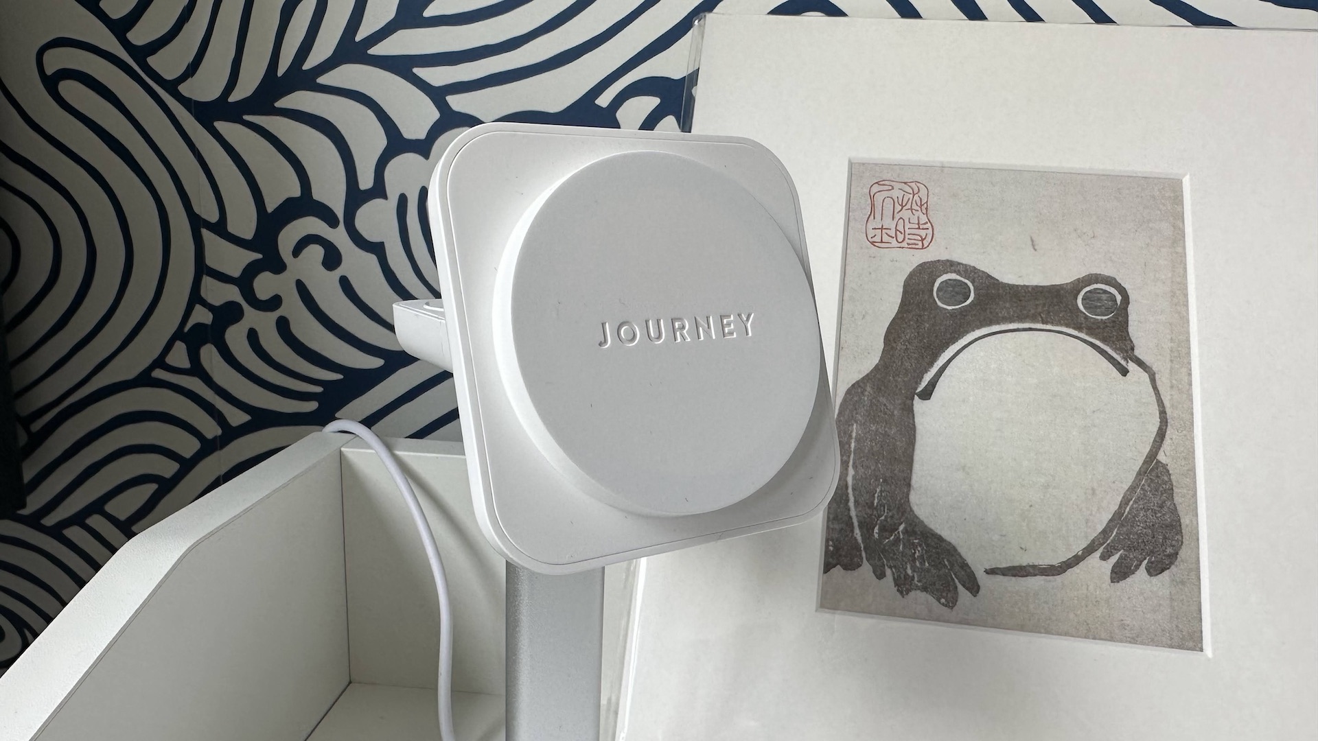 The Journey Rapid Trio 3-in-1 Wireless Charging Station on a bedside table