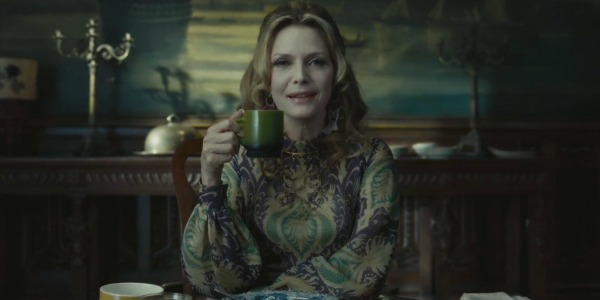 Michelle Pfeiffer holding a cup in Dark Shadows