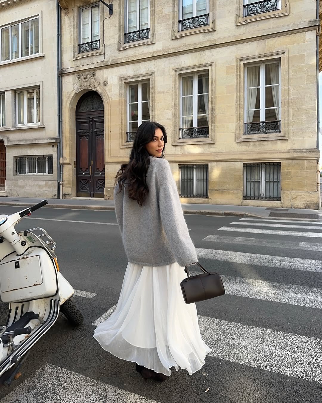 Mobina Peiman with long, glossy hair and natural makeup