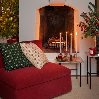 Christmas candle ideas with red chair and gold candle ring