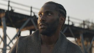 John David Washington in The Creator, a movie that Chris Weitz worked on the story for.