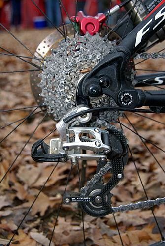 SRAM's X.0 rear derailleur knocks off shifts out back.