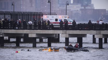 Divers search sightseeing helicopter crash in New York's Hudson River