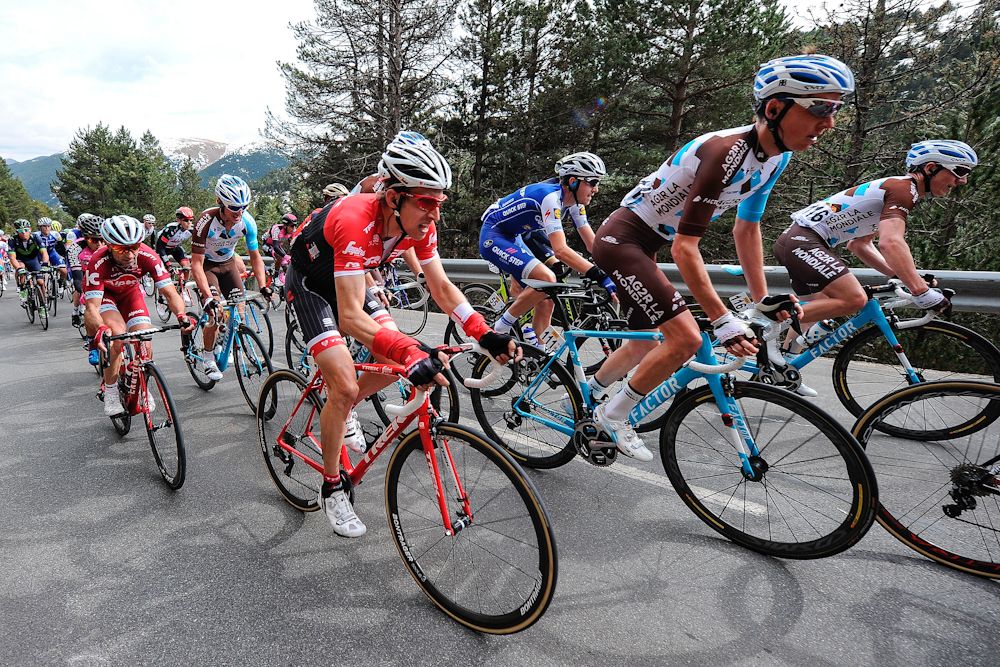 Bauke Mollema (4thR) and AG2R La Mondiale's French rider Romain Bardet (R) ride on the third day of the 97th Volta Catalunya