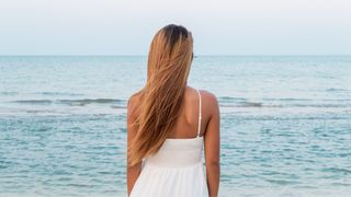 woman looking at sea