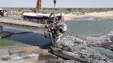 A destroyed bridge inside Iran.