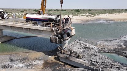 A destroyed bridge inside Iran.