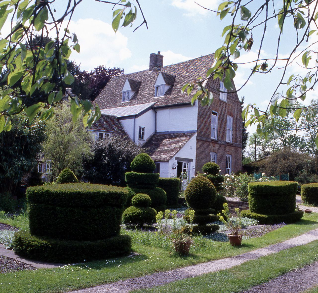 The view over the garden to The Manor in Hemingford Grey, famous as the house of Green Knowe by Lucy Boston.