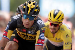 Team Jumbo Vismas Primoz Roglic of Slovenia L and Team Deceuninck Quicksteps Julian Alaphilippe of France wearing the overall leaders yellow jersey ride during the 2nd stage of the 108th edition of the Tour de France cycling race 183 km between PerrosGuirrec and Mur de Bretagne Guerledan on June 27 2021 Photo by STEPHANE MAHE POOL AFP Photo by STEPHANE MAHEPOOLAFP via Getty Images