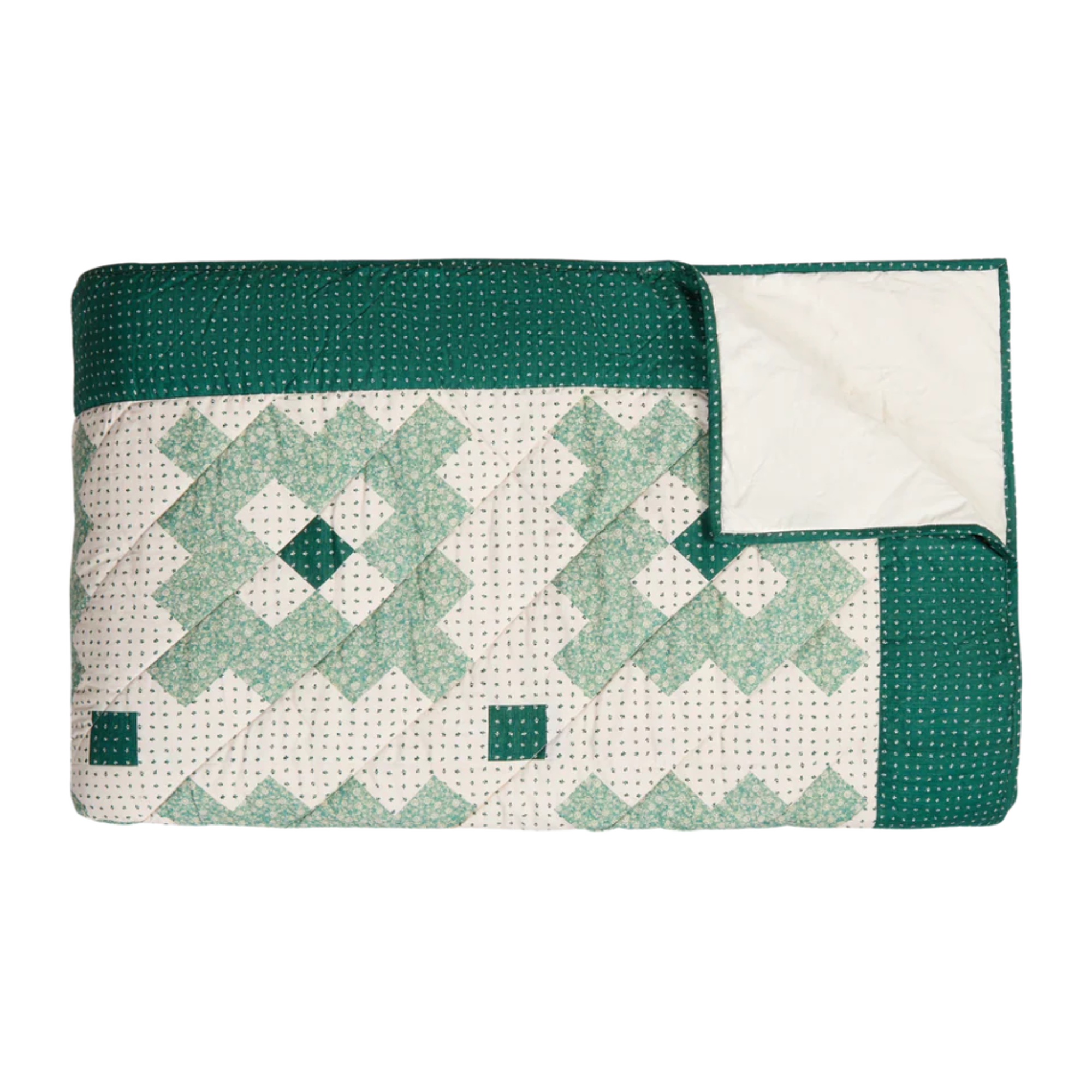 a green patchwork quilt