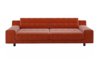 An orange velvet sofa from Habitat