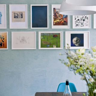 room with blue wall and picture frame
