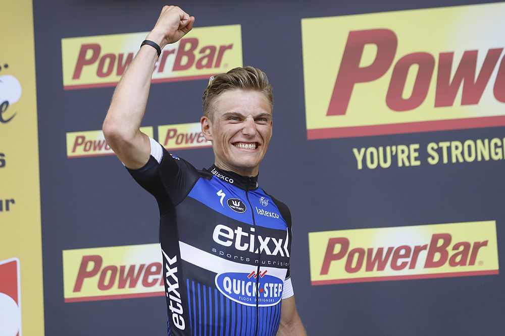 Marcel Kittel (Etixx-QuickStep) flex on the podium after winning stage 4 Tour de France