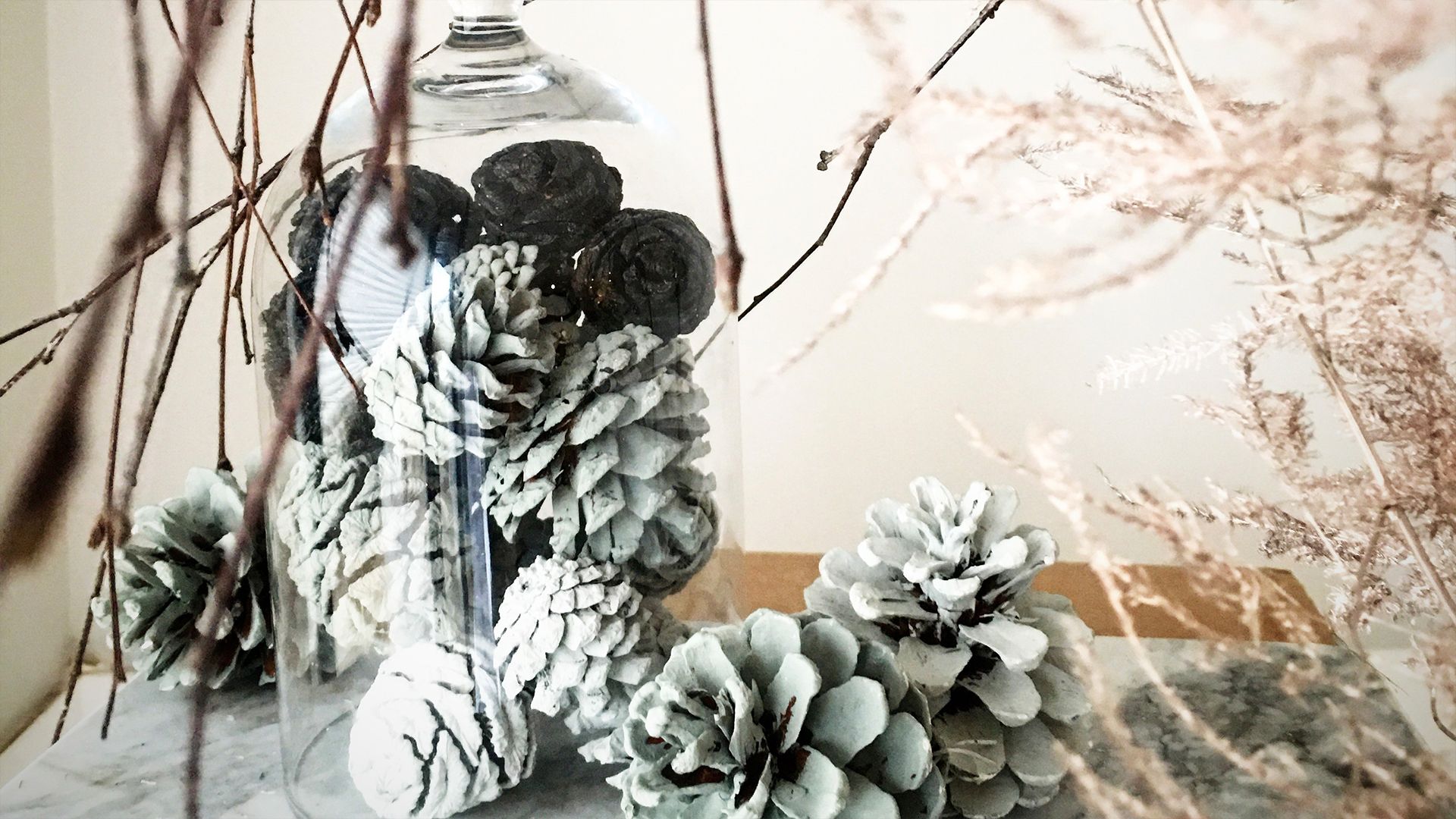 how to style a hallway with painted pinecones