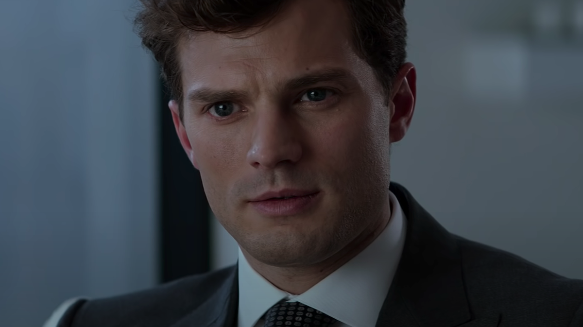 Jamie Dornan as Christian Grey in Fifty Shades of Grey