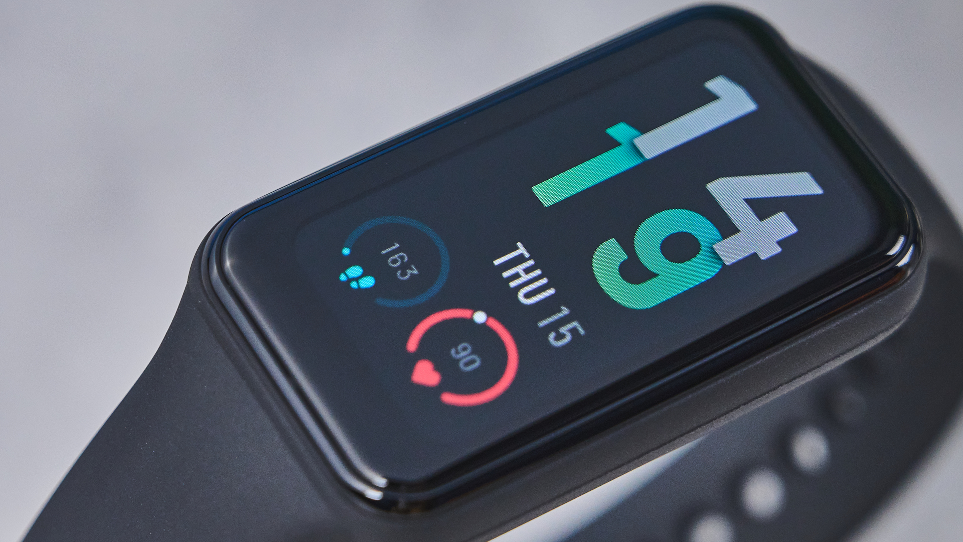 the amazfit band 7 fitness tracker, a budget fitness tracker with a simple black band and small yet bright LED screen