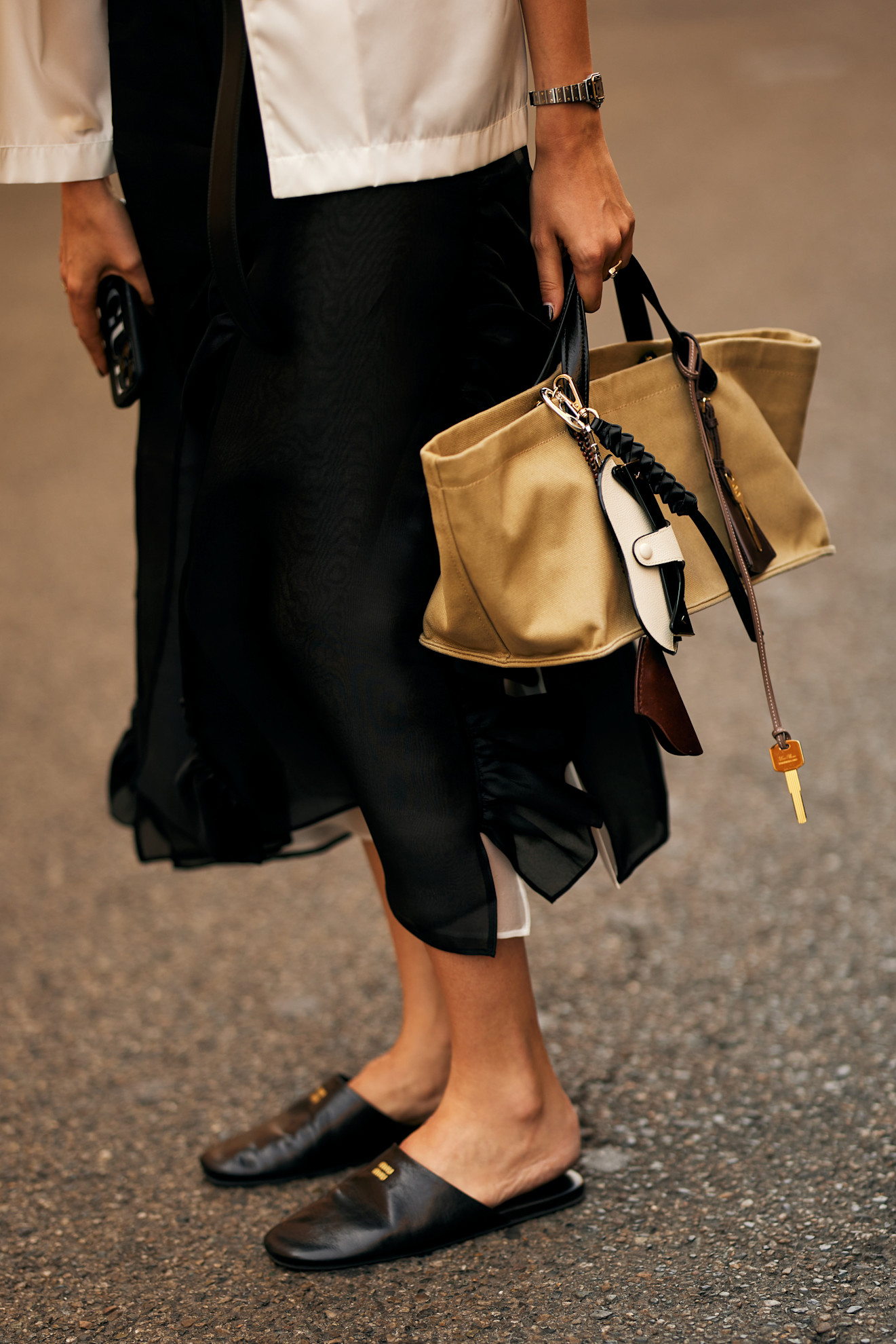 woman wearing a leather mule