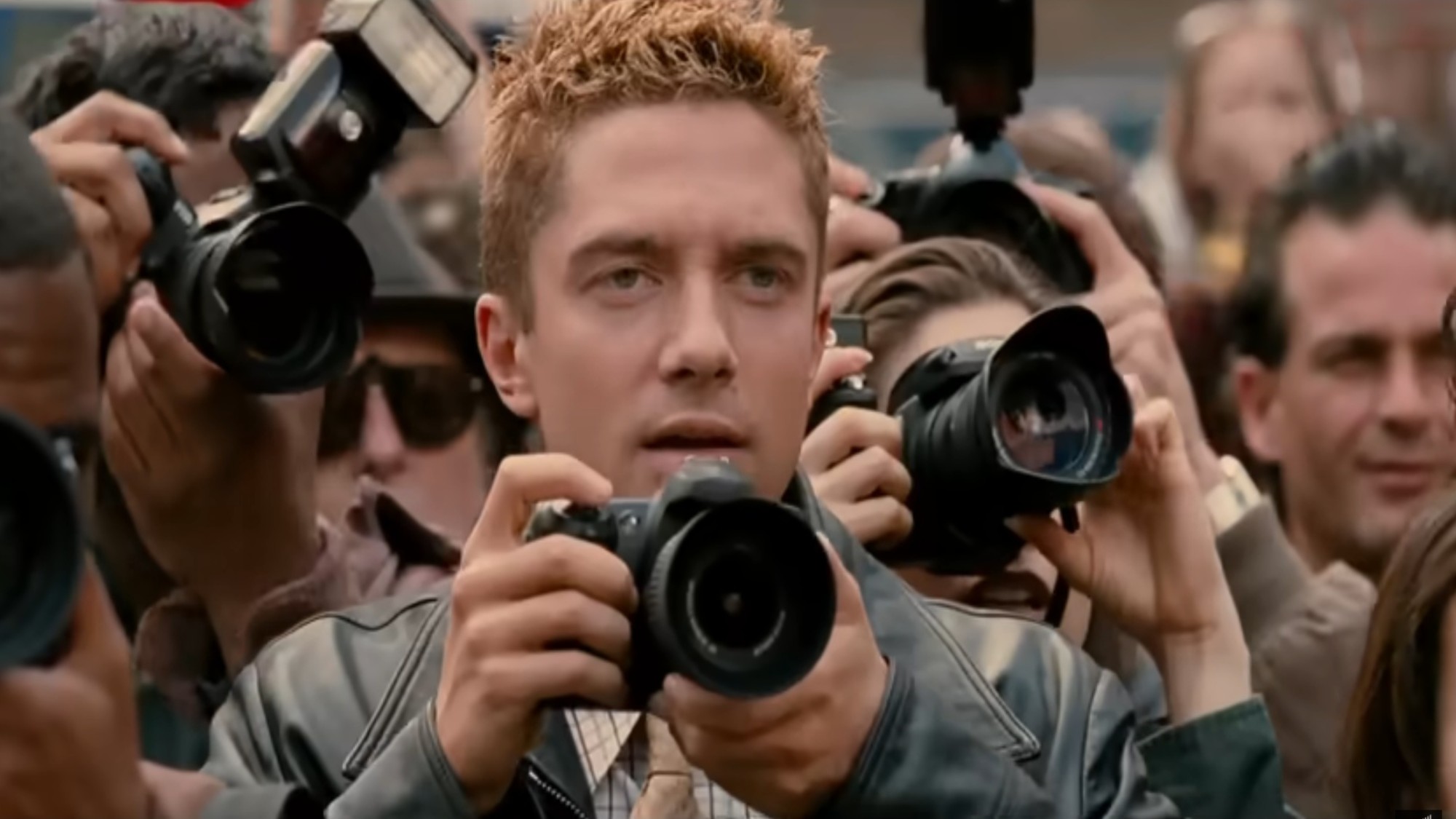 Topher Grace taking a picture in Spider-Man 3