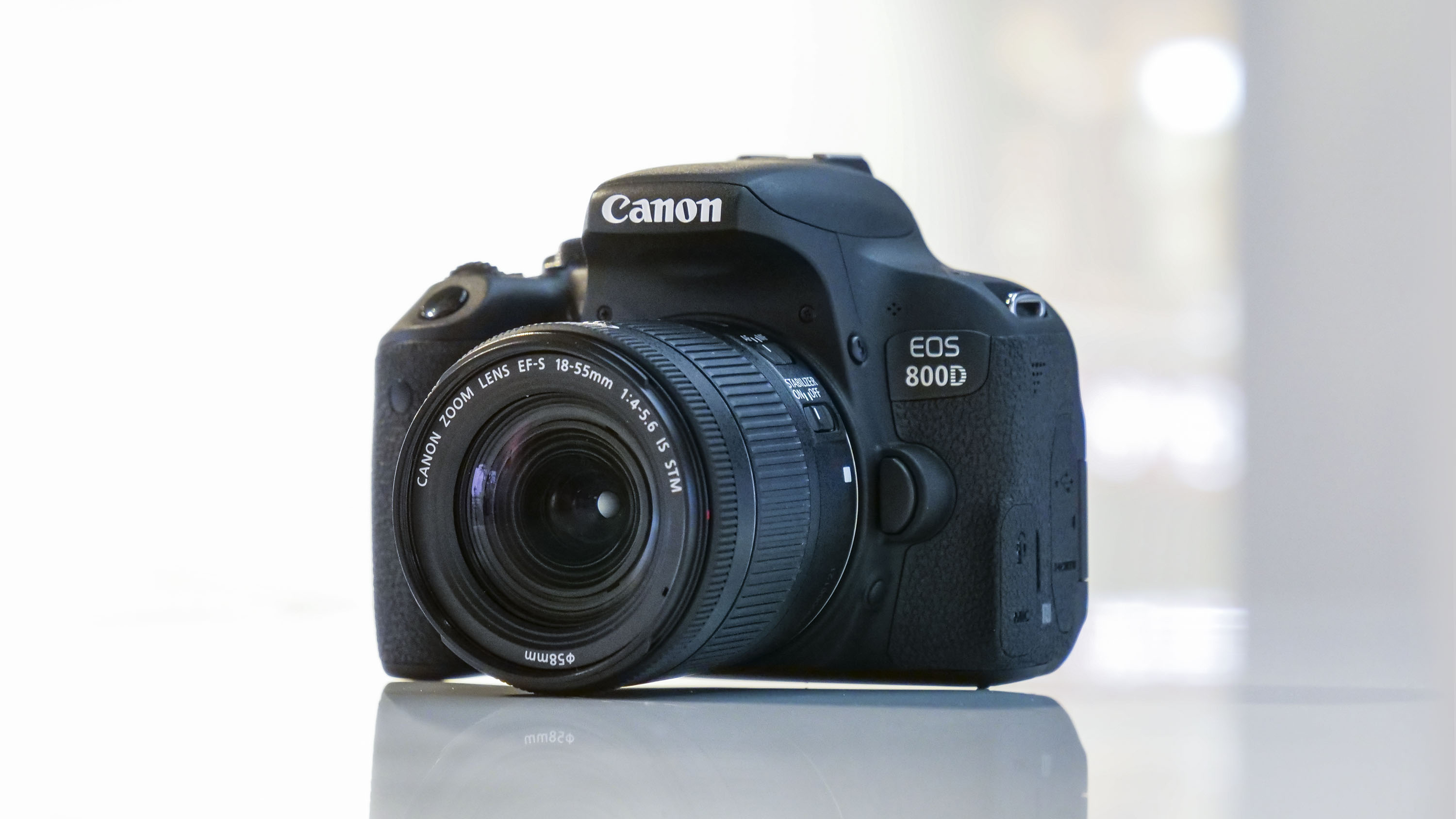 best DSLR camera Canon EOS 800D sitting next to a window