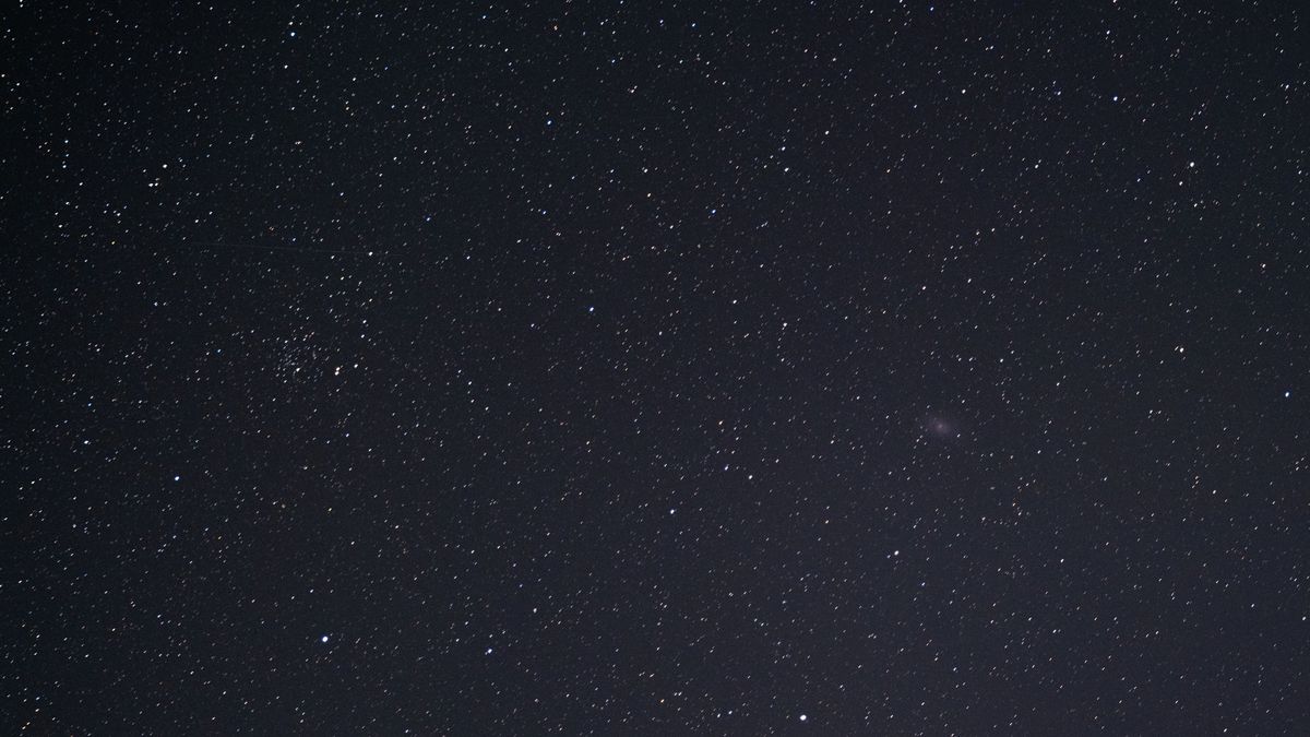 The Triangulum galaxy (M33) and NGC 752 in the night sky, as photographed by the Fujifilm GFX100S II.
