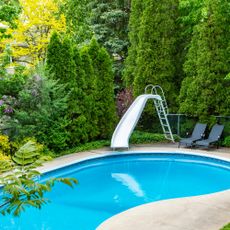 backyard with pool and slide