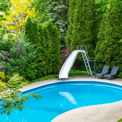backyard with pool and slide