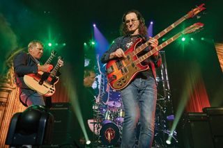 Sticking their necks out: Alex Lifeson and Geddy Lee on the R40 tour.