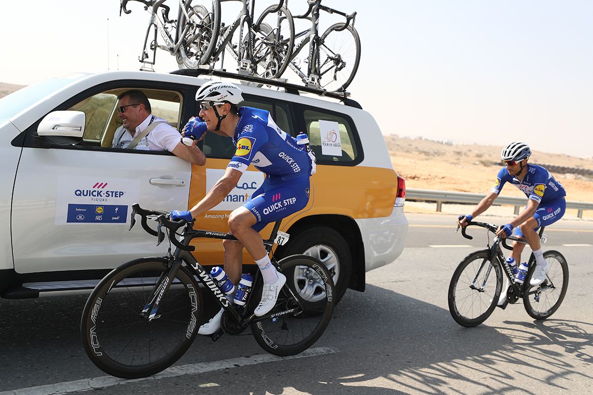 Davide Martinelli and Eros Capecchi back at the Quick-Step Floors team car.