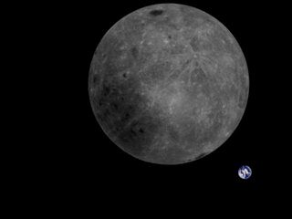 The far side of the moon, with Earth visible in the distance.